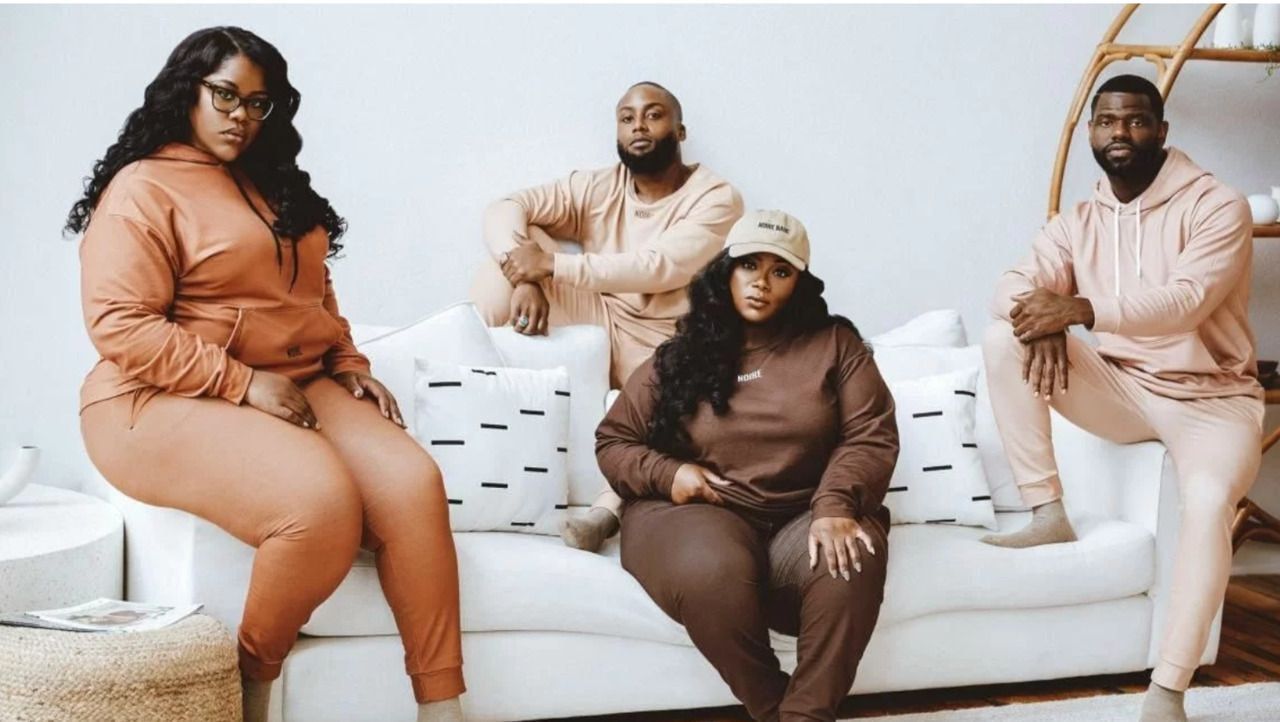 a group of people sitting on a couch